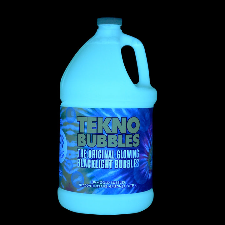 Gallon of TEKNO Gold under blacklight